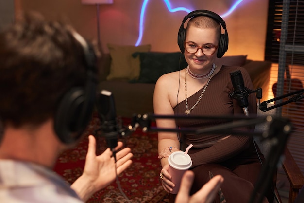 Singing lessons instructor demonstrating proper vocal technique and breathing