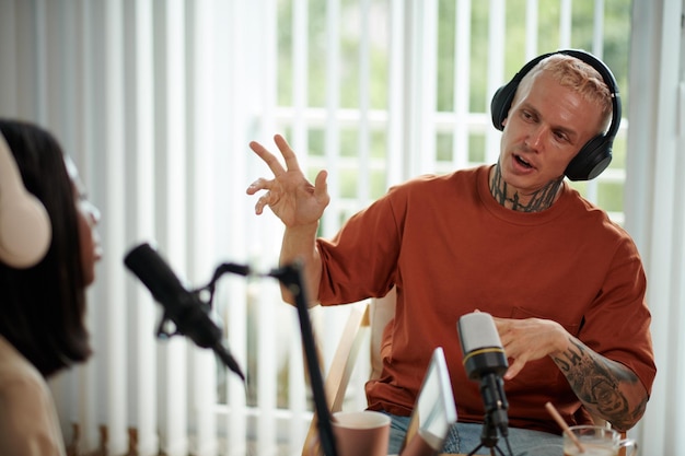 Graduate displaying certificate after completing vocal performance course